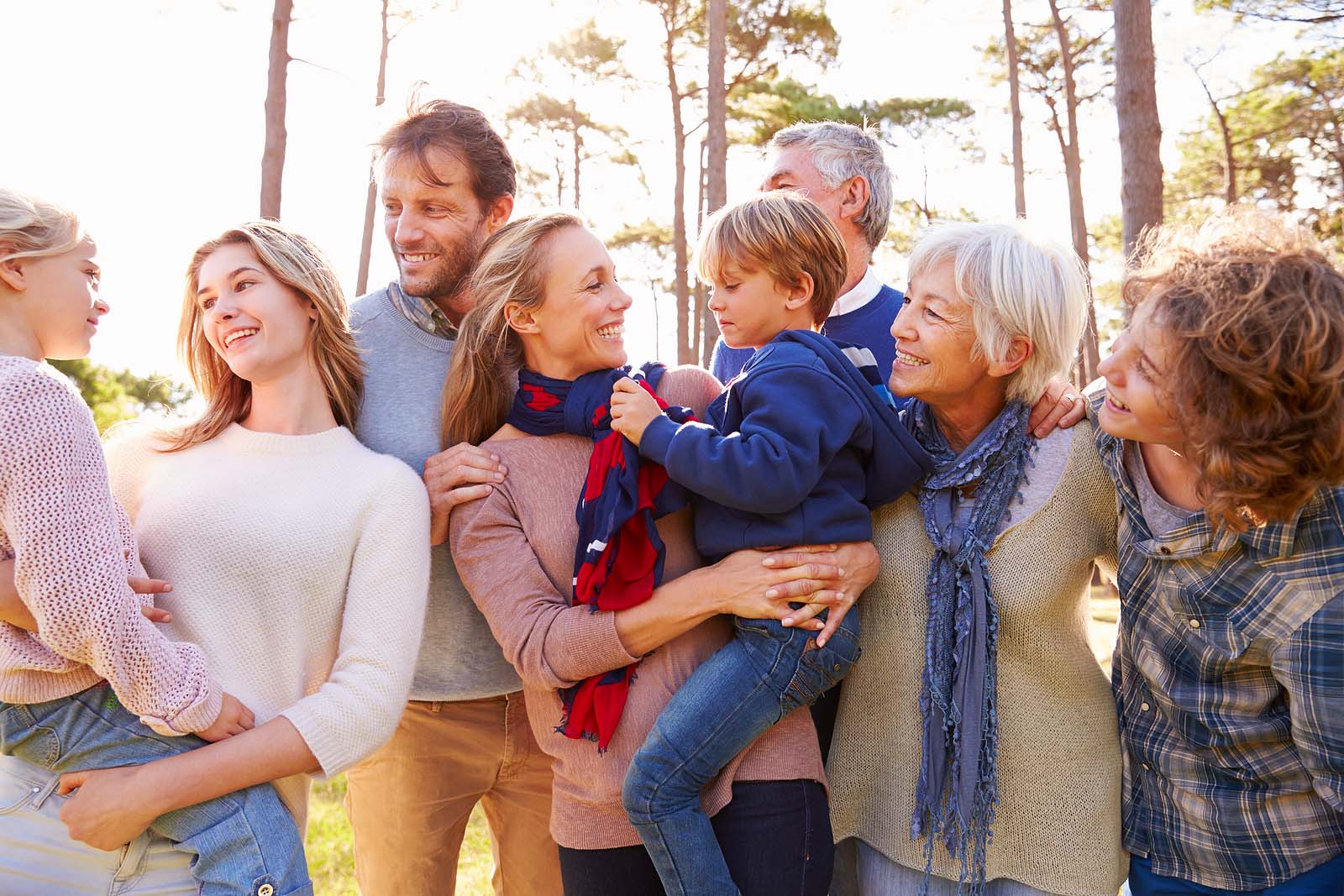 Happy multi-generation family in the countryside